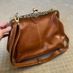 Pretty vintage looking purse.